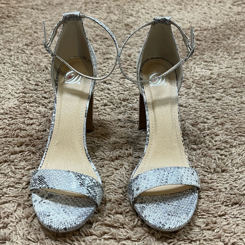 BRAND NEW snakeskin high heel sandals.